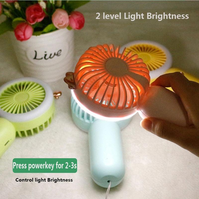 Mini Portable Fan with LED Glow Light — Content Creator Essential for Travel at Home or On-the-Go.
